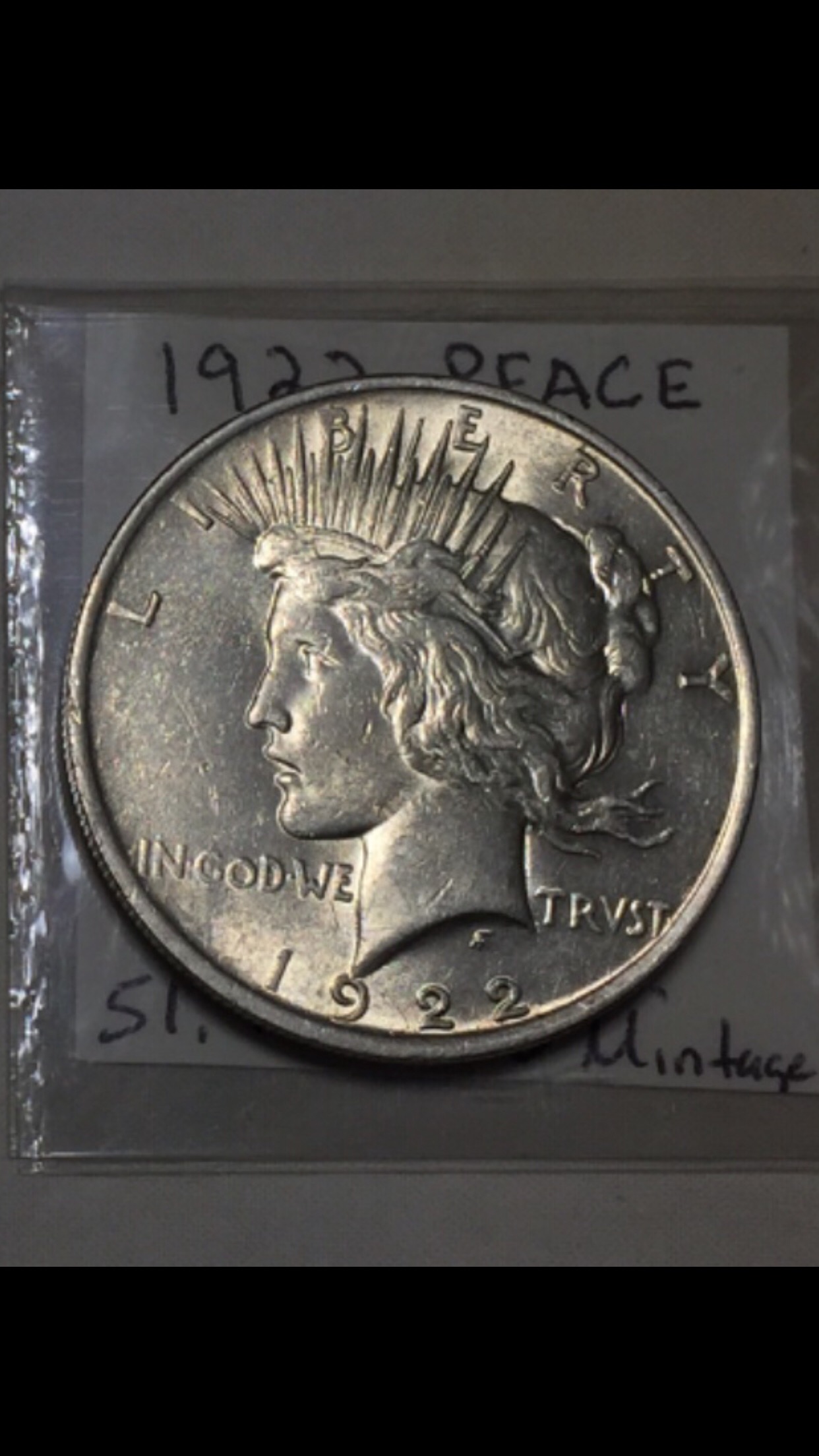 1922-Peace-Dollars-What-Grade-And-Which-One-Should-I-Keep-Help-Please