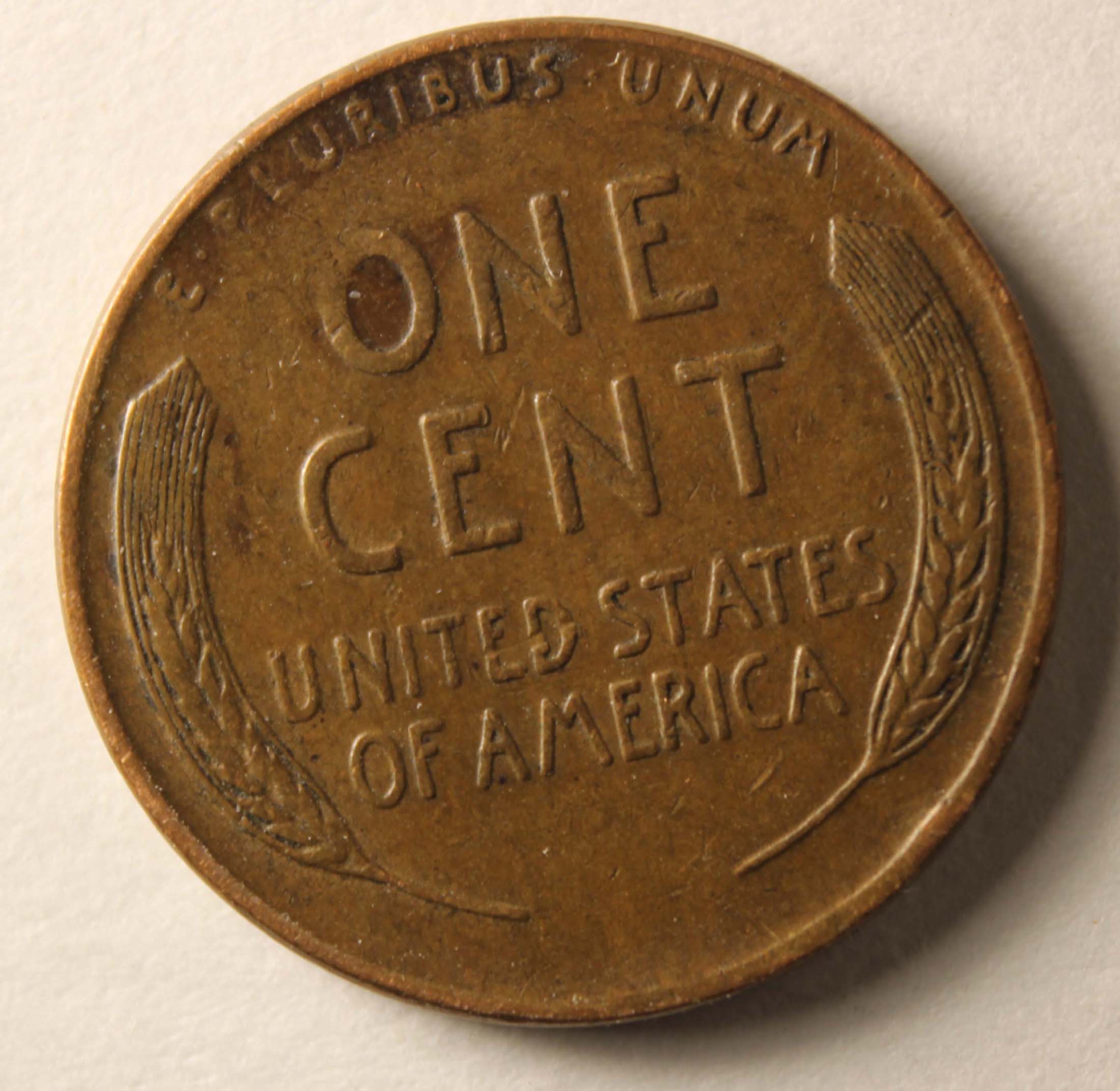 Damaged-Planchet-Or-Strike-Through-On-1944-Lincoln-Cent?