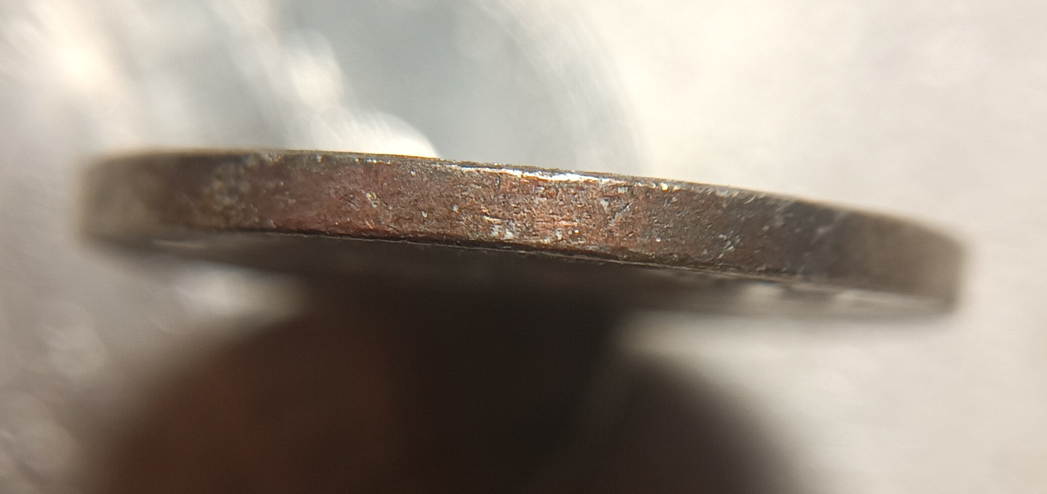2006-P-Nickel-With-Shiny-Copper-Showing-On-Obverse,-Reverse-And-Edge.