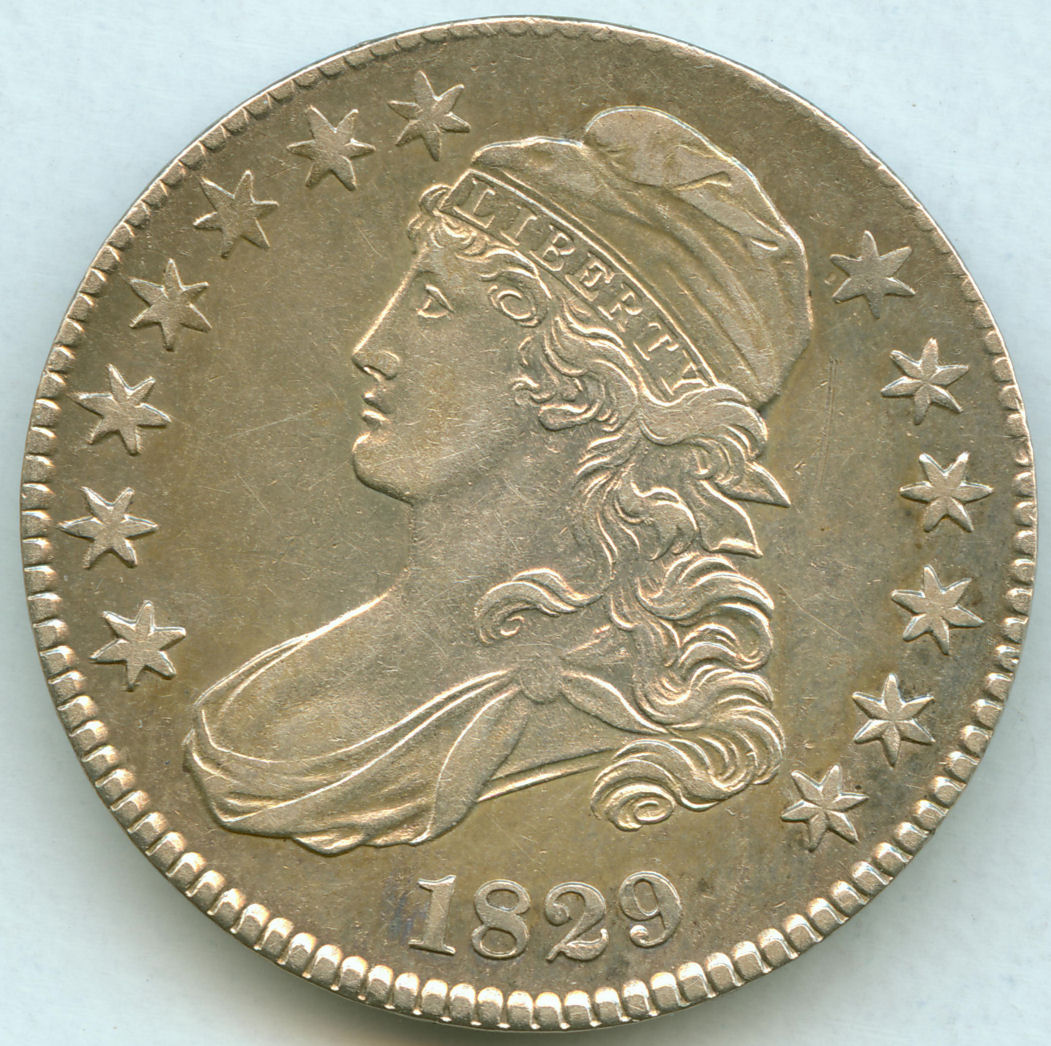 Pair-Of-Capped-Bust-Halfs
