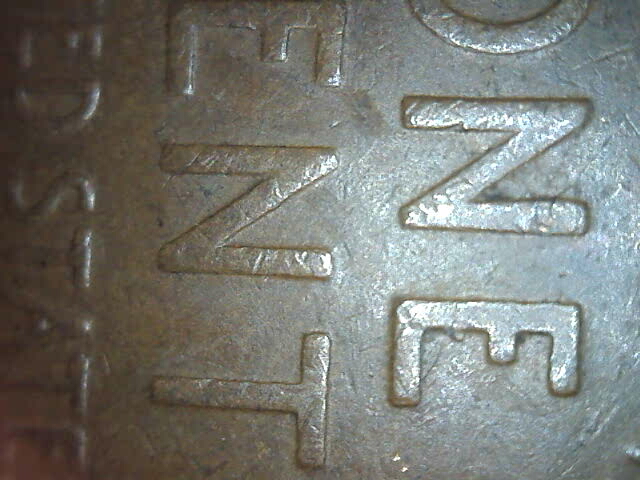 1924-Wheat-Cent---Reverse-Die-Chip-Looks-Like-A-Little-E-In-Big-E