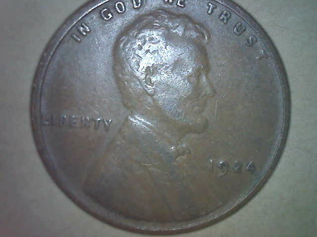 1924-Wheat-Cent---Reverse-Die-Chip-Looks-Like-A-Little-E-In-Big-E