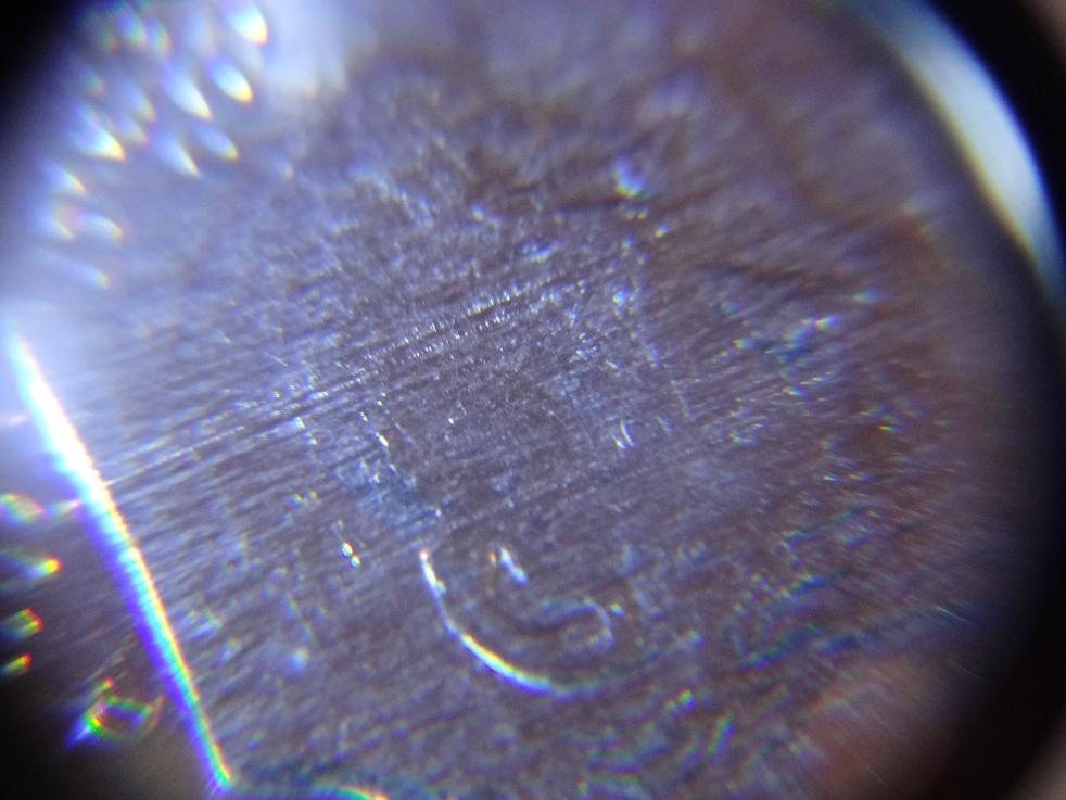 2012-D-Dime-With-A-Blotch-On-Cheek?