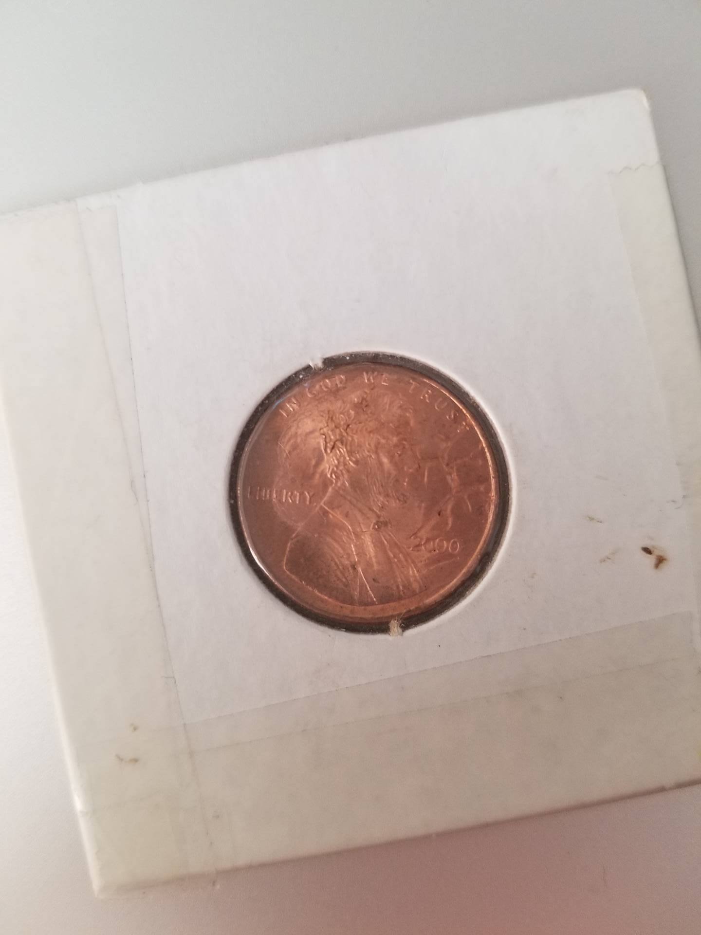 Weird-Penny-Markings-2000-Blank-Mint-Mark-Like-An-Antler-Or-Lightning?