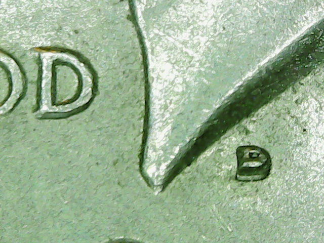 JFK-1968-D-Strange-Mint-Mark