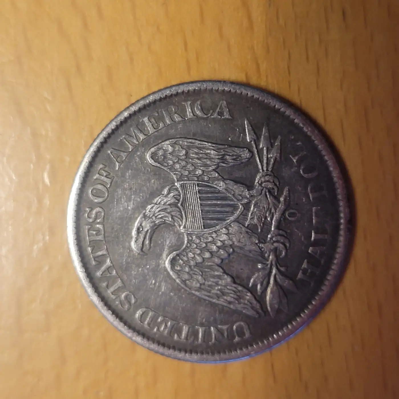 1861-O-Seated-Liberty-Half-Dollar-Worth-Grading?