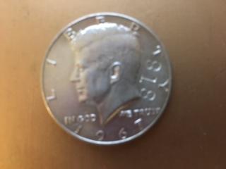 Please-Help!-1967-Uncirculated-Kennedy-Coin