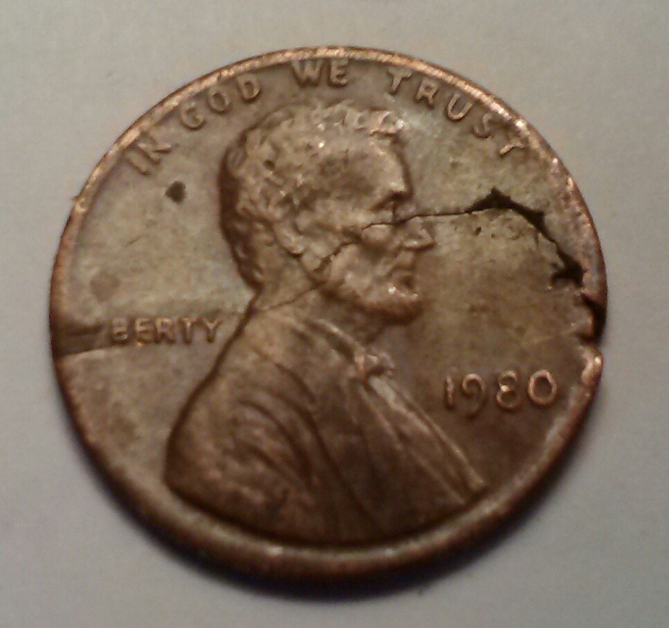 1980-P-LMC-Is-It-A-Lamination-Or-Post-Mint-Damage?