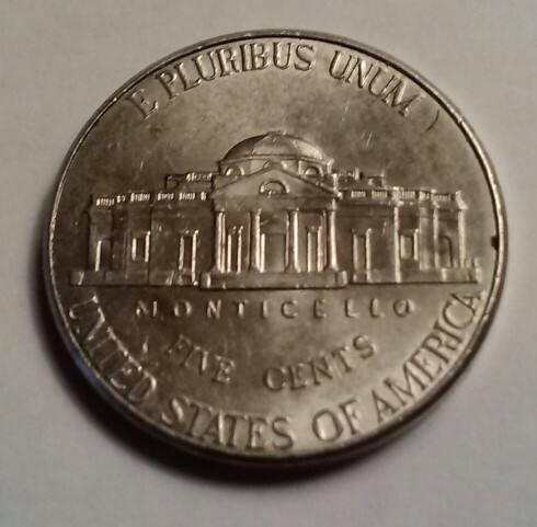 2014-P-Jefferson-Nickel-Something-With-Right-Eye-Lid?