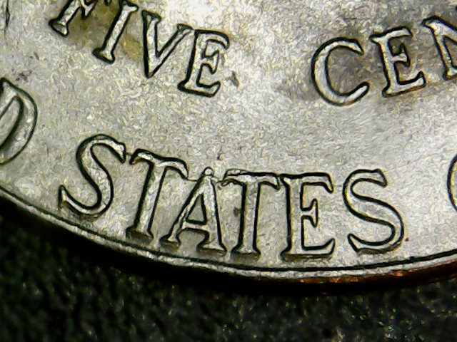 2014-P-Jefferson-Nickel-Something-With-Right-Eye-Lid?