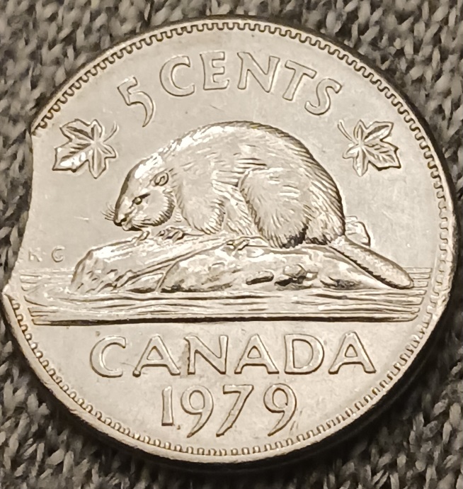 1979-Curved-Clipped-Planchet-Nickel