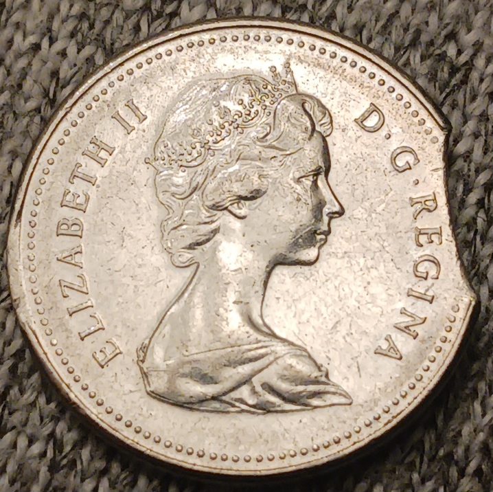1979-Curved-Clipped-Planchet-Nickel