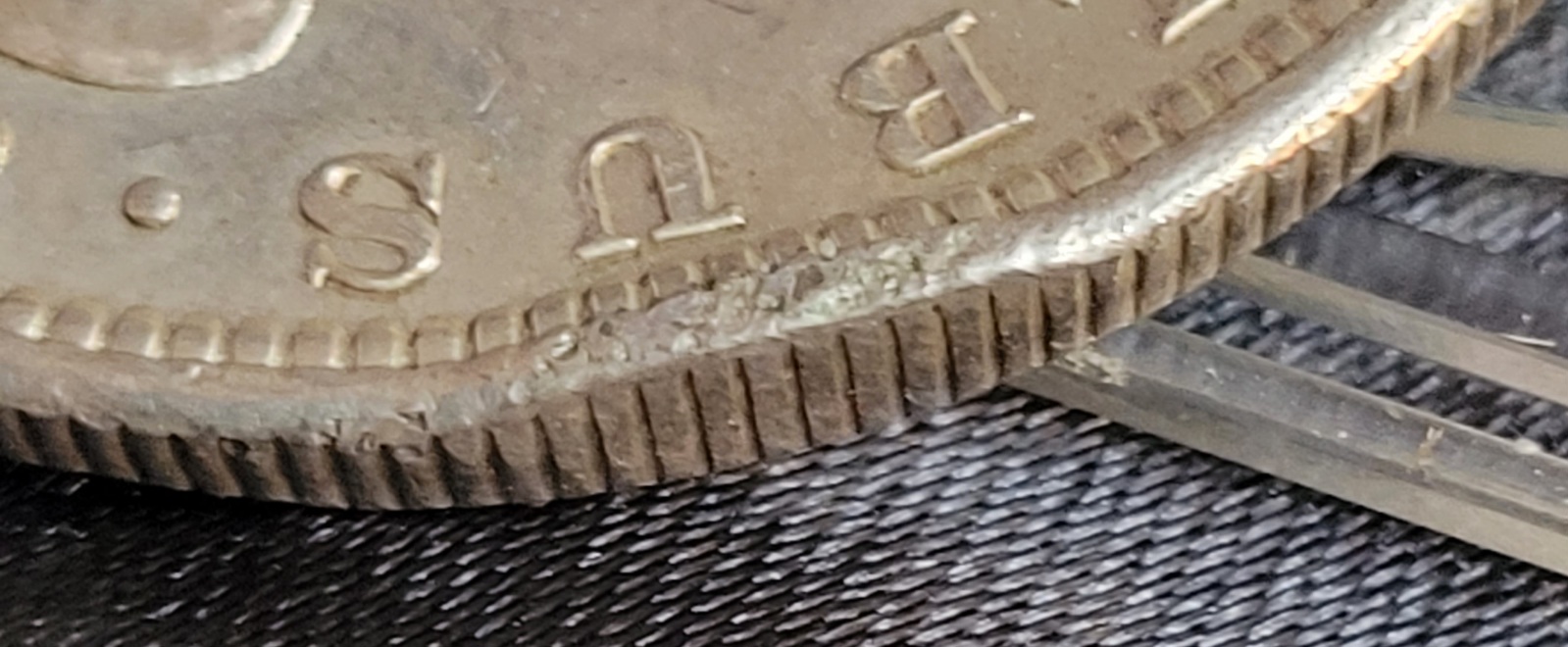Need-Help-With-An-1880-S-Morgan-Dollar-Strange-Marking