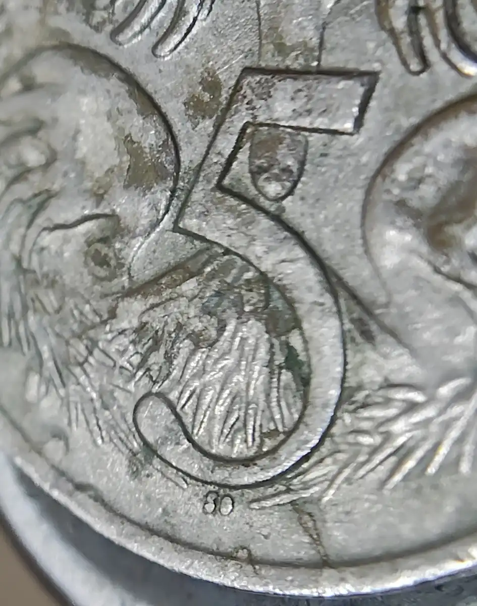 1975-5-Cent-Coin-With-Multiple-Blobs