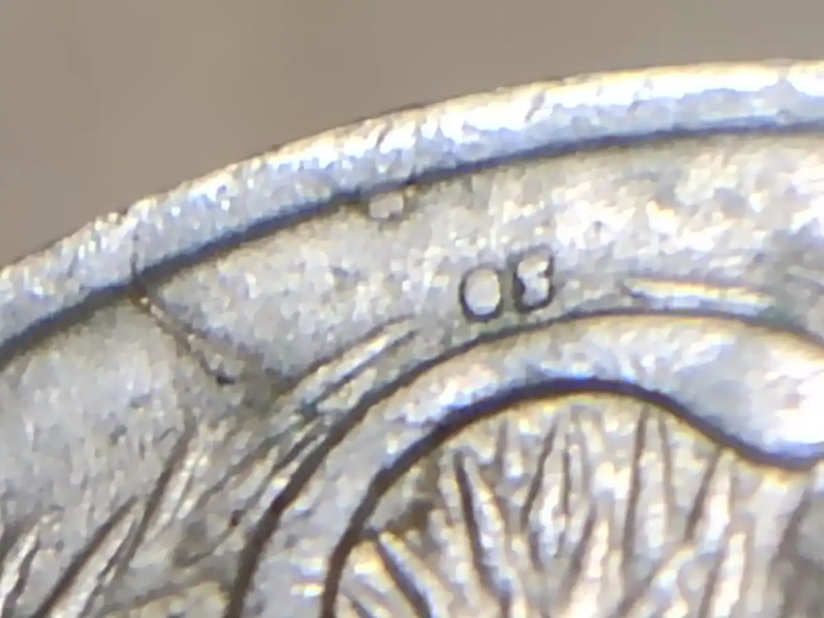 1975-5-Cent-Coin-With-Multiple-Blobs
