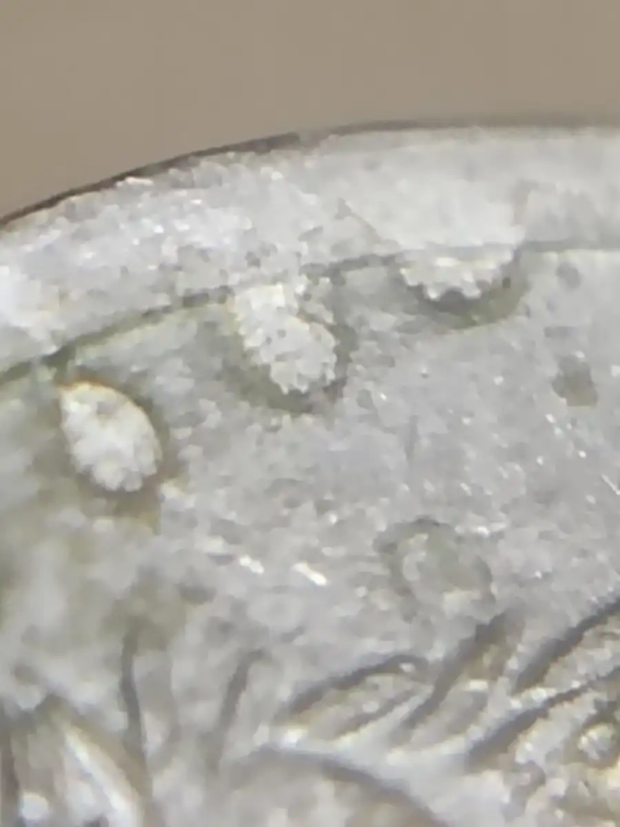1975-5-Cent-Coin-With-Multiple-Blobs