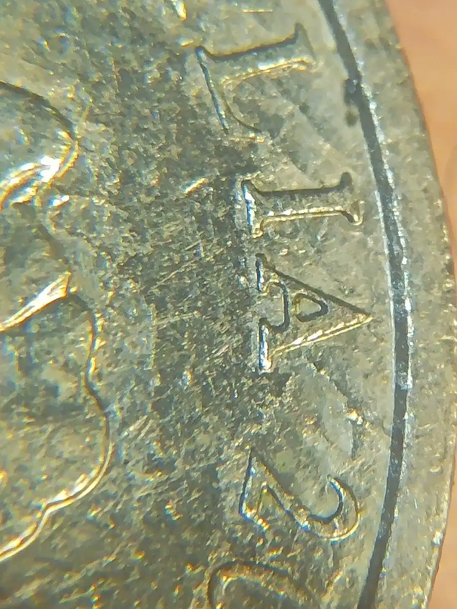 2000-Ten-Cents-With-Weird-Extra-Images-Obverse/Reverse