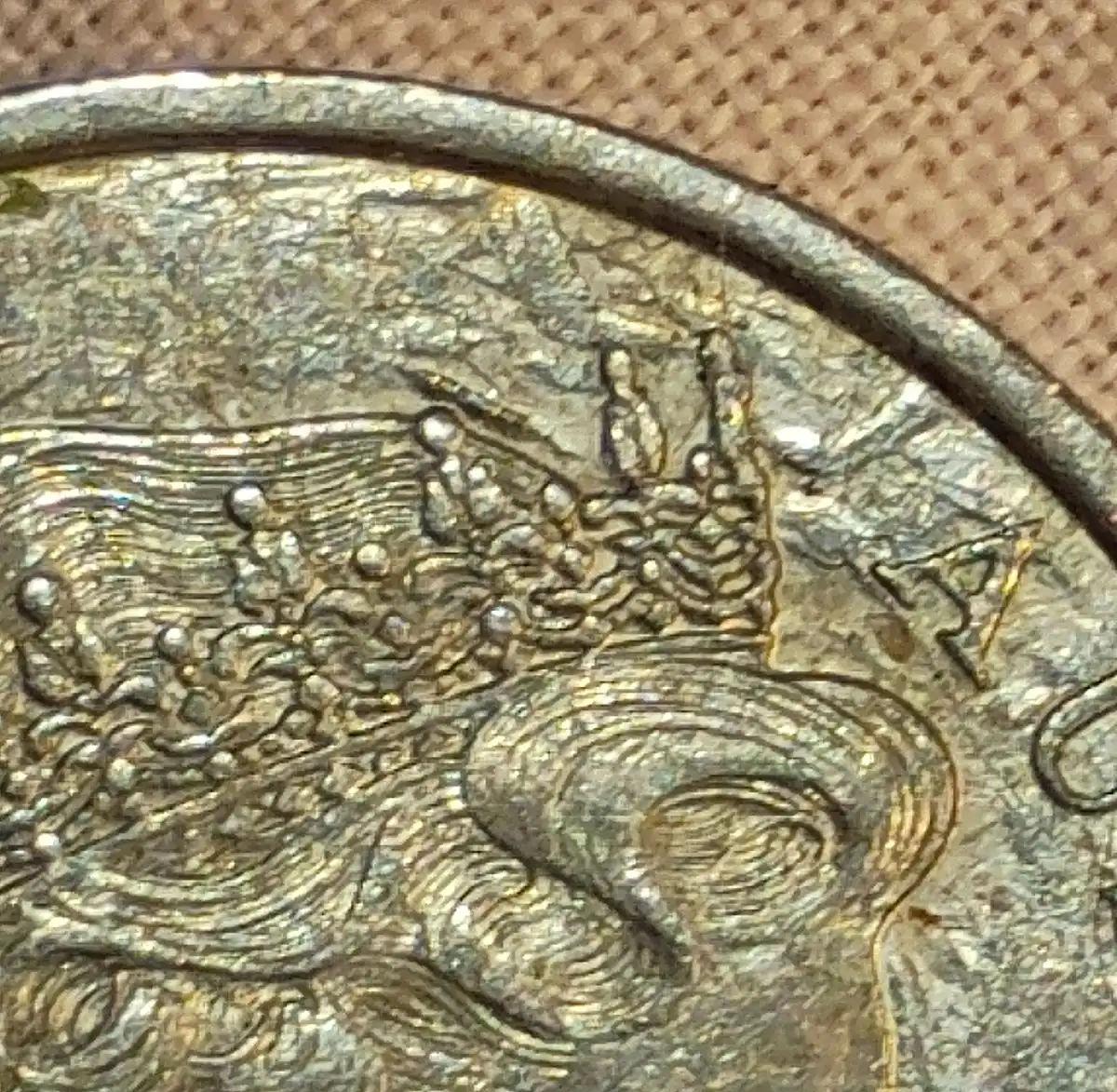 2000-Ten-Cents-With-Weird-Extra-Images-Obverse/Reverse
