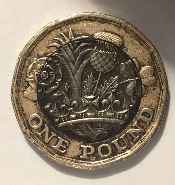 A-Couple-Of-GB-£1-Coins-With-Errors