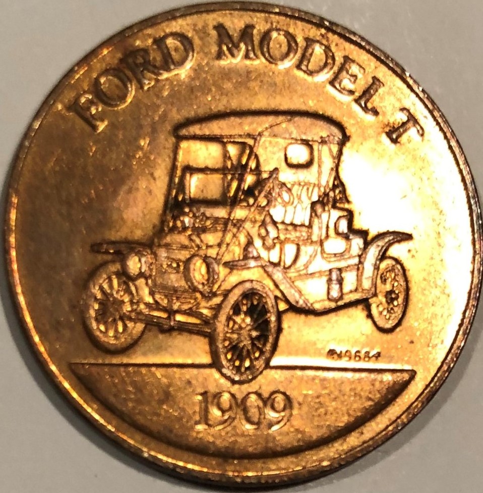 Ford-Motor-Company-Copper-Coin-Dated-1909.--Ford-Model-T-On-Back
