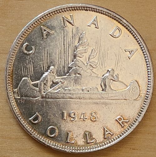 Help-With-Authenticating-This-1948-Silver-Dollar?