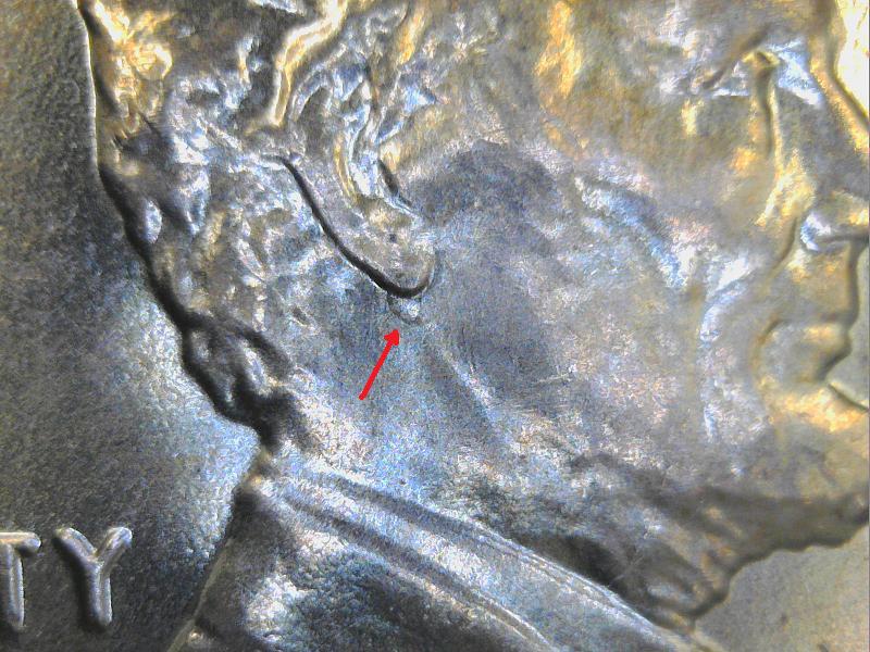 2018-Penny-Mark-Next-To-The-Ear-What-Is-It?