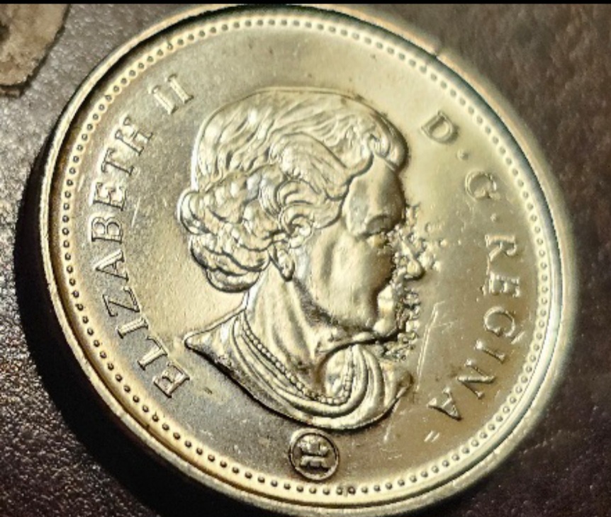 2007-Nickel-Struck-Through-Retained-Resin/Plastic?