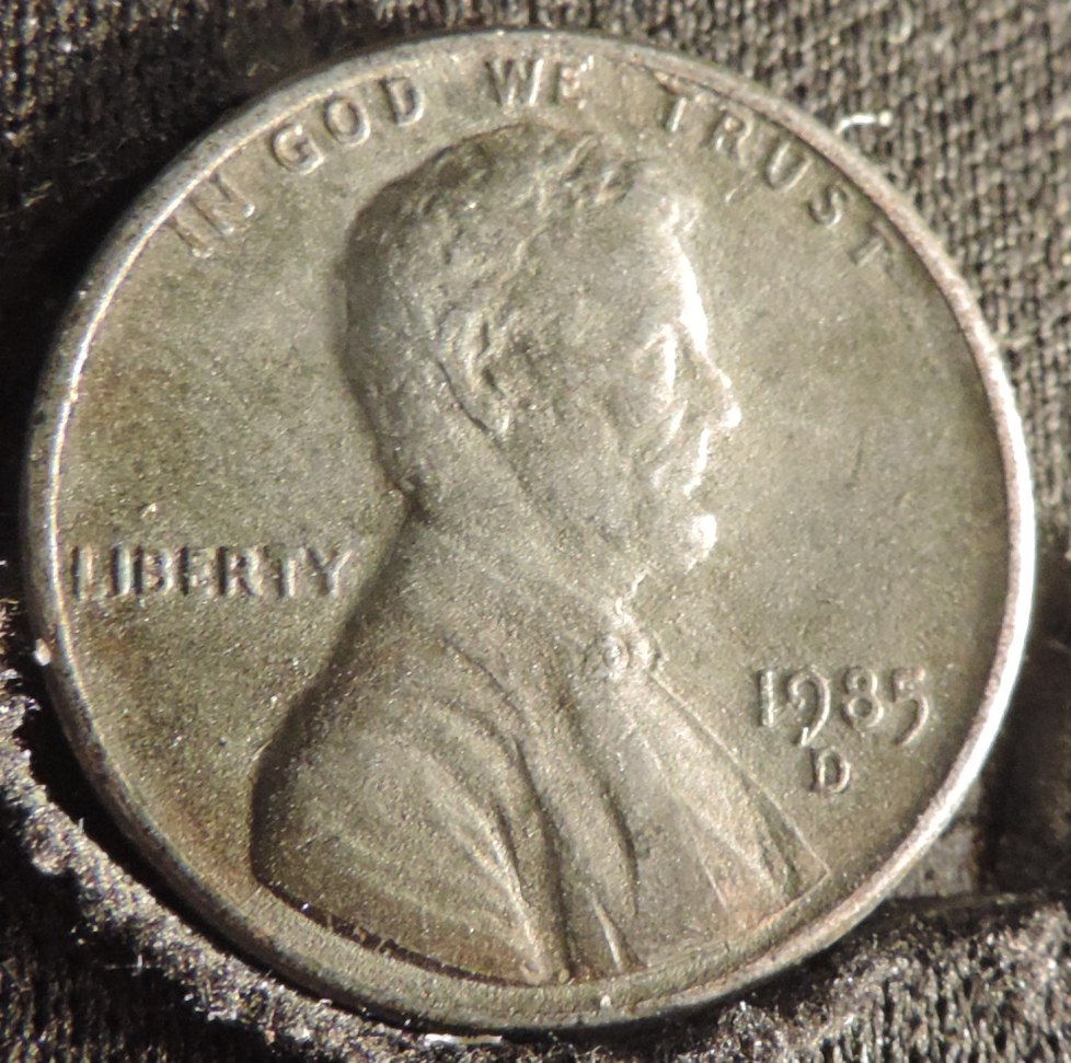 1985-D-Silver-Tone,-Non-Metalic-Cent.