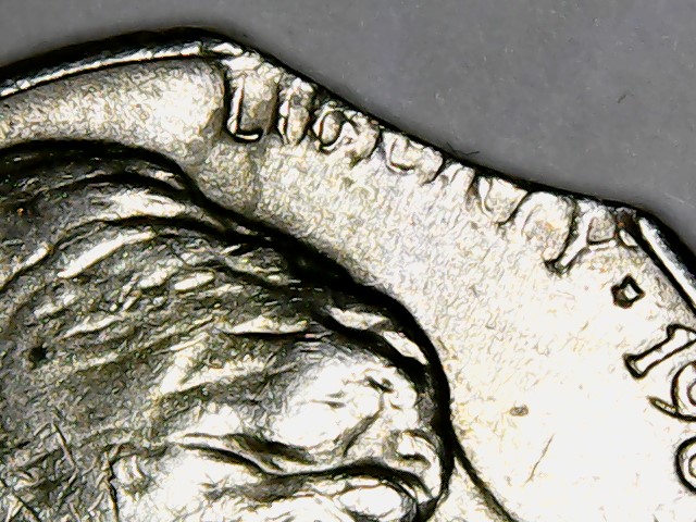 Help-With-1980-Nickel-Cut-Off-Along-The-Edge.-Damage-Or-Something-Else?