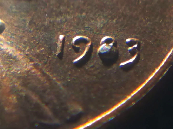 1983-Penny-With-Melted-8-And-A-Possible-Crack-In-The-Back.