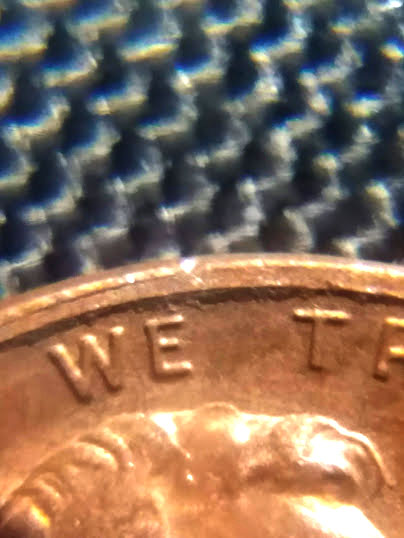1987-Penny-With-Melted-Dot-Next-To-7.