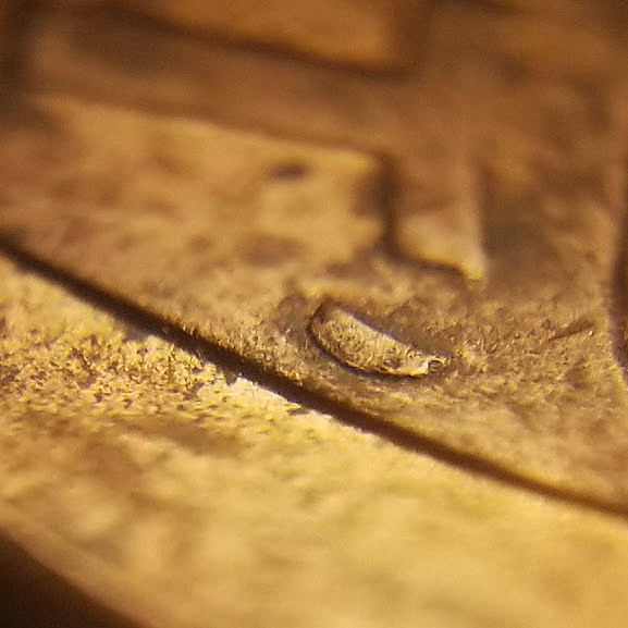 2016-Penny..with-A-Small-Shape-Next-To-Cent...what-Could-It-Be?