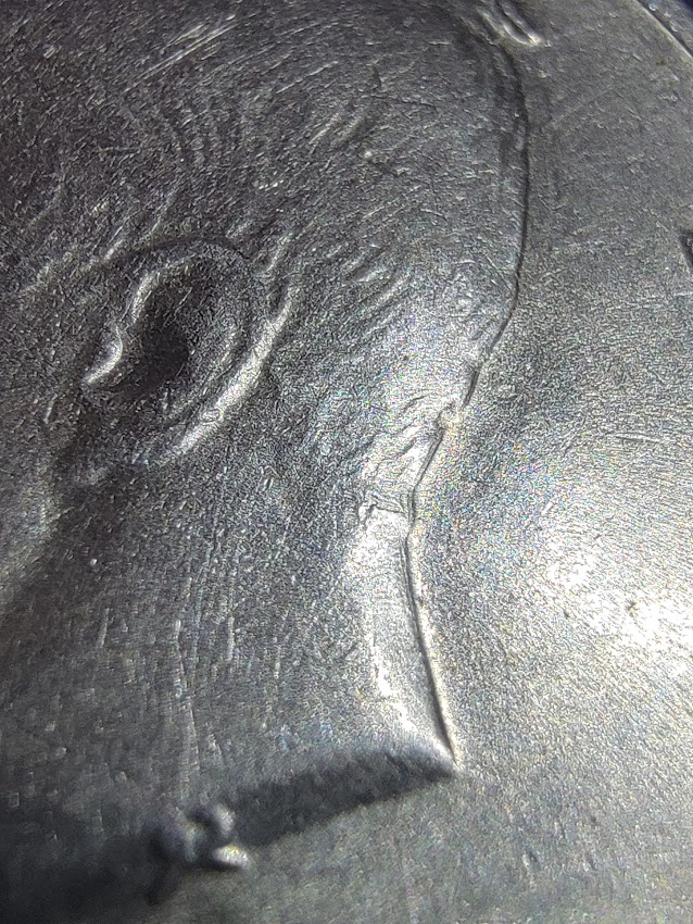 1972--Kennedy-Half-Dollar.---Doubling-In-The-Back-Side-Of-Head.