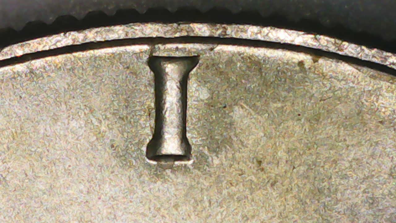 1969-D-Half-Dollar-Strike-Though-Glue-Or-Wax