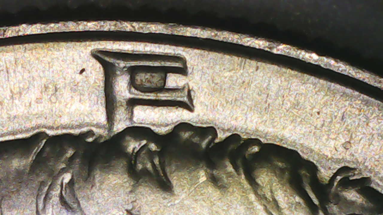 1969-D-Half-Dollar-Strike-Though-Glue-Or-Wax