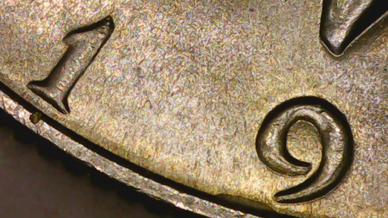 1969-D-Half-Dollar-Strike-Though-Glue-Or-Wax