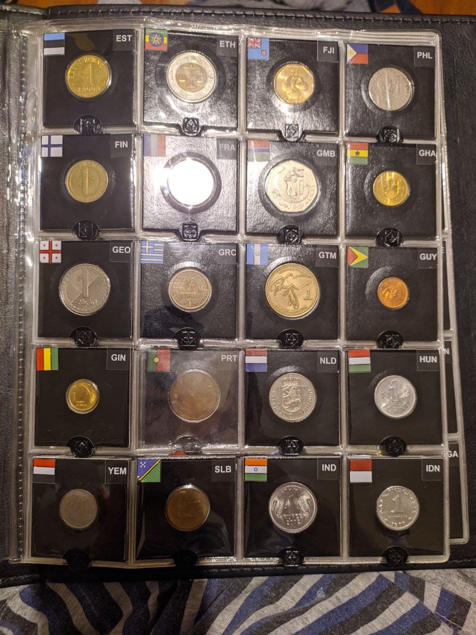 Trying-To-Collect-$1-Coins-From-Around-The-World