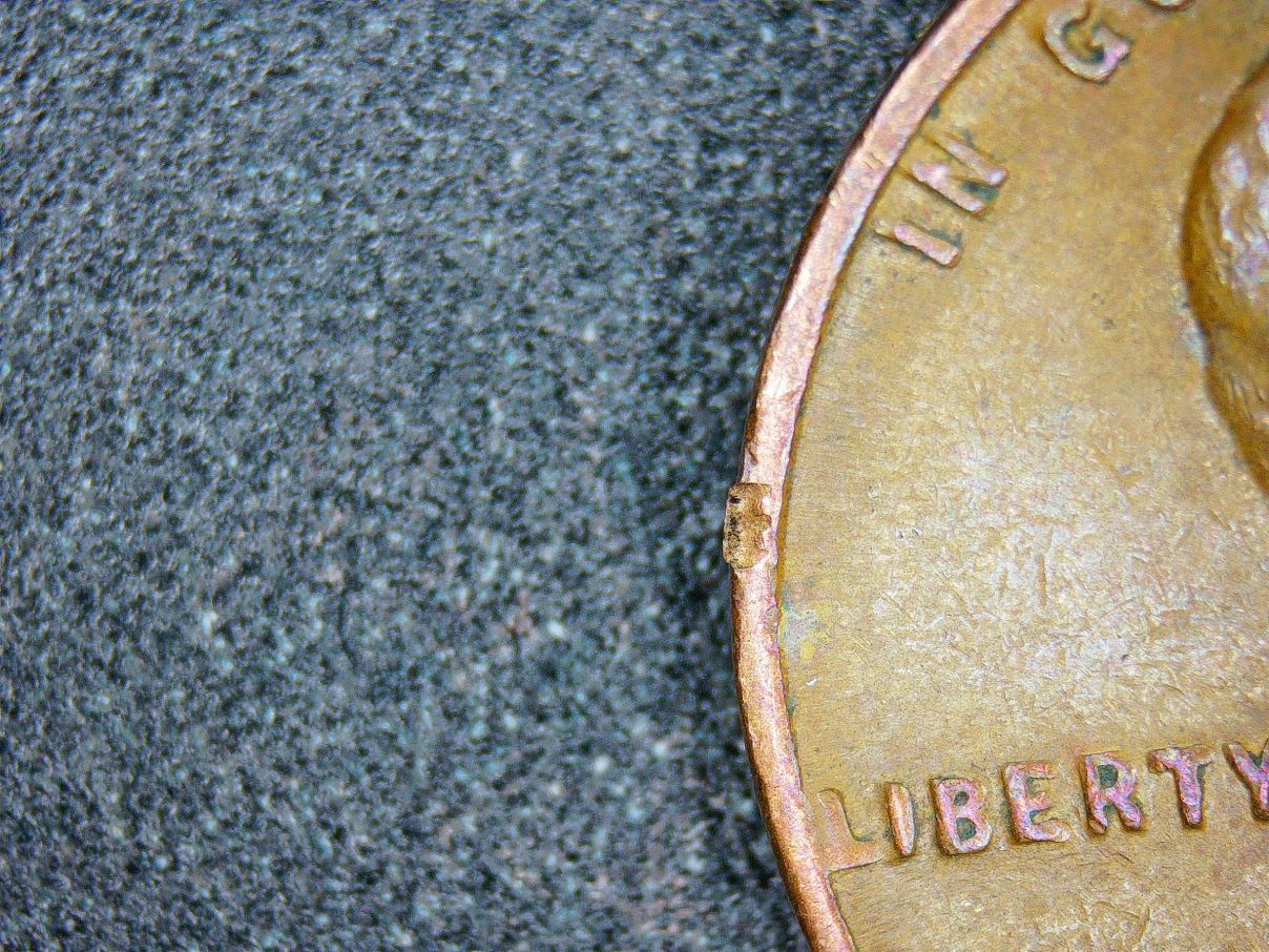 1949-Wheat-Penny.-Is-That-An-E-Stamped-On-The-Rim?