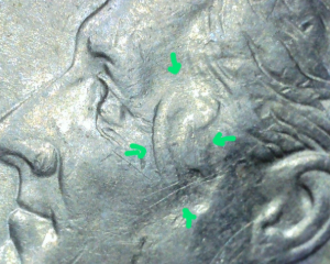 2002-D-Dime--&-Double-Rim-Across-Face-&-Second-Ear-Left-Side-Of-Face