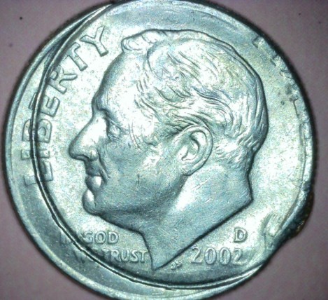 2002-D-Dime--&-Double-Rim-Across-Face-&-Second-Ear-Left-Side-Of-Face