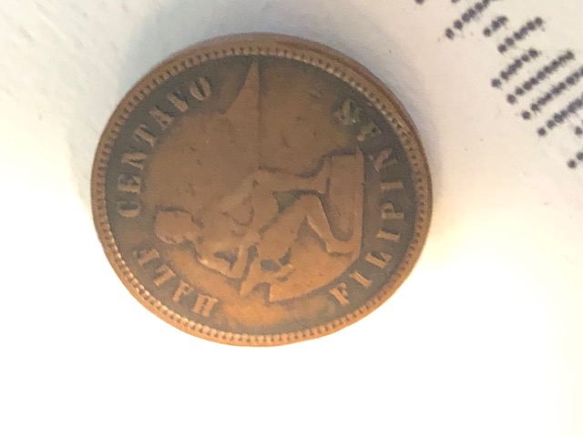 Strange-Defect-On-1903-US-Philippines-Half-Cent