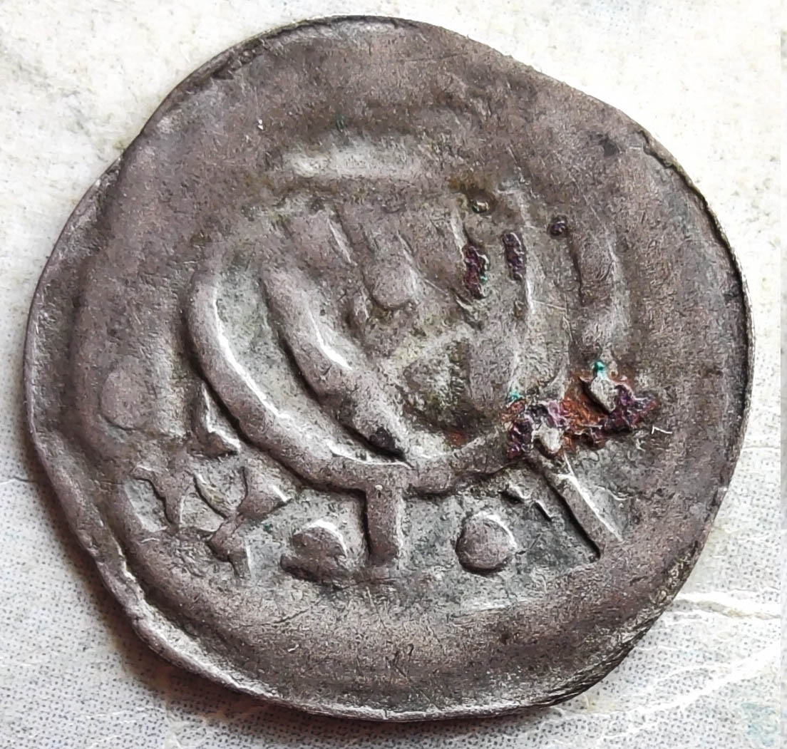 Silver-Coin-With-A-Cross-And-A-Hand