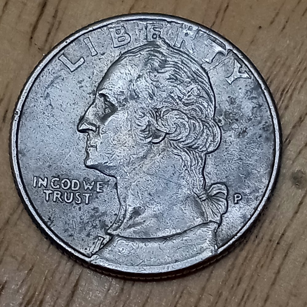 Washington-Quarter-With-Cud-Error-Over-Date