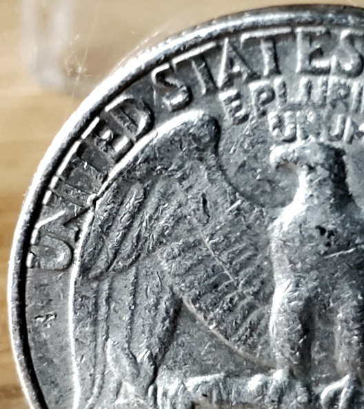 1989-P-Quarter-Reverse-'I'-In-'United'--Connected-To-Eagle-Wing;-Damage-Or-Error?