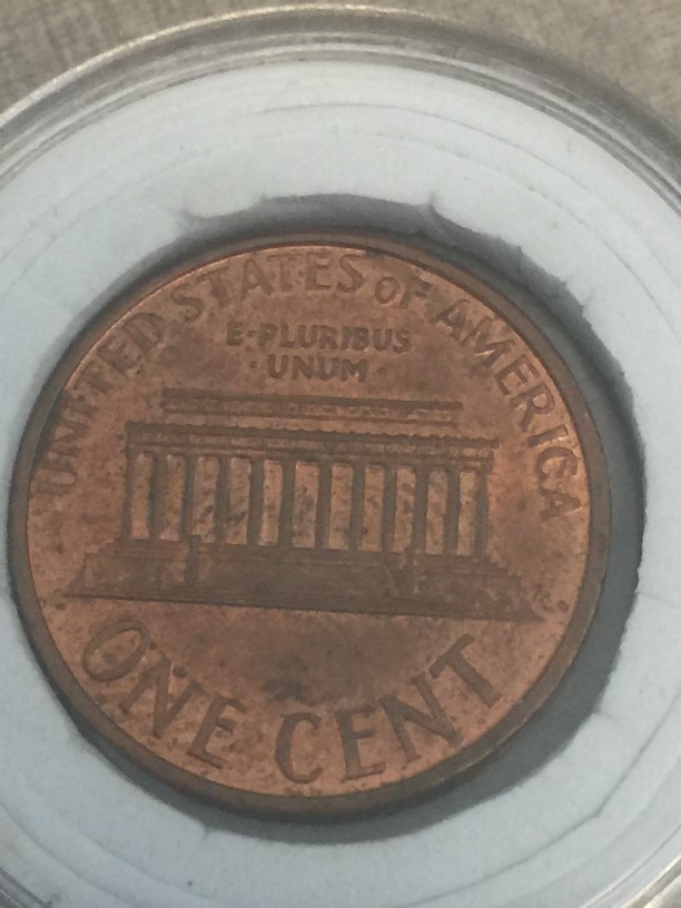 Penny-With-Tiny-Objects-On-Obverse