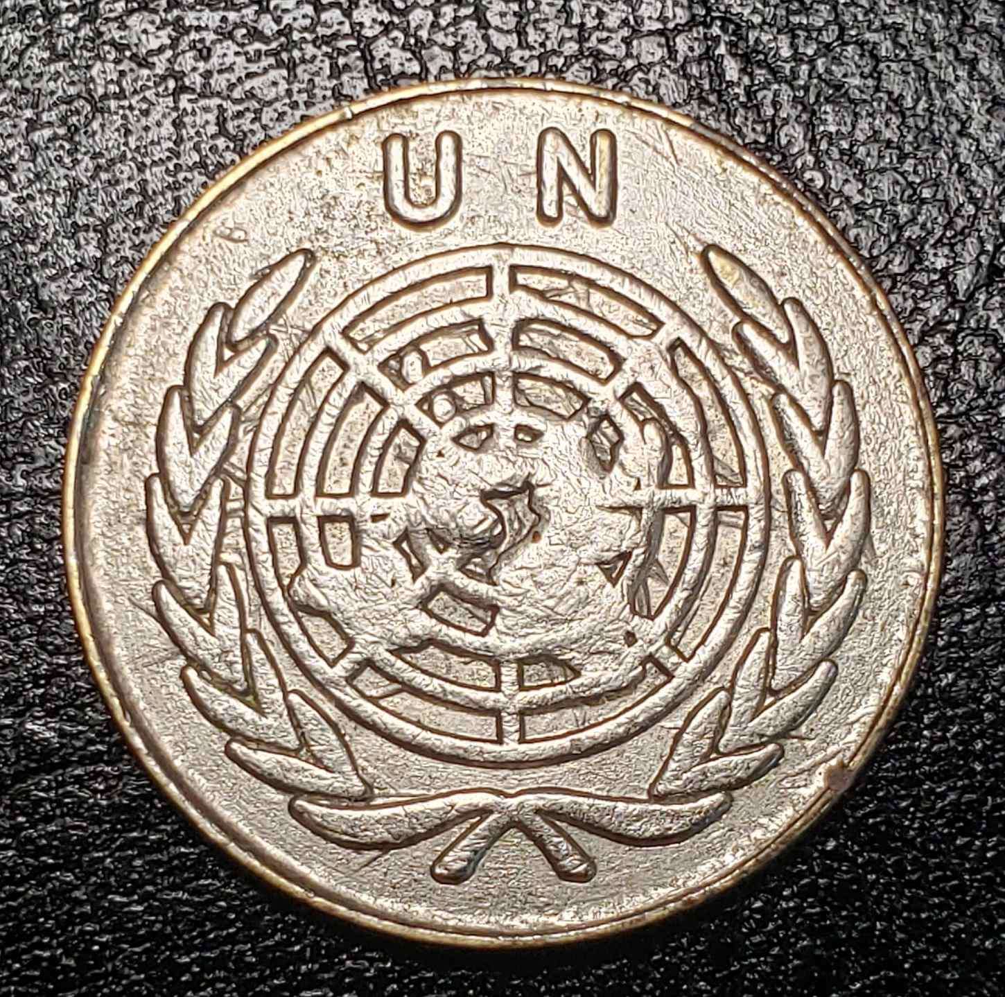 Unidentified-Coin.-Un-And-A-Map-On-Both-Sides