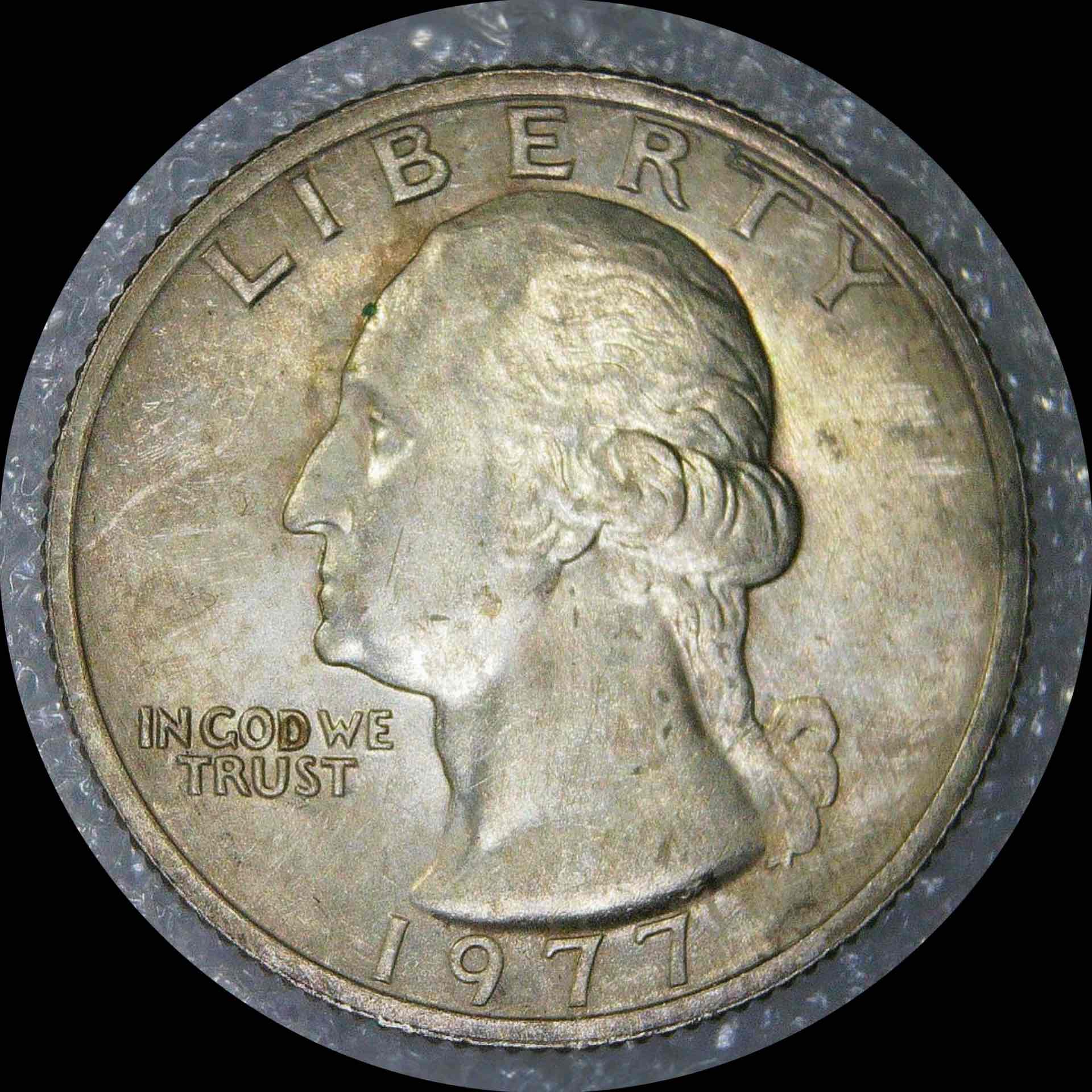1977-No-Mint-Appears-To-Have-Proof-Like-Attributes-Or-Silver-[1977-Quarter]
