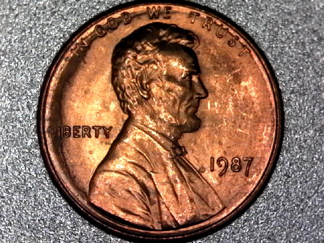 Penny-With-Raised-Half-Circle-Going-Thru-In-God-We-Trust