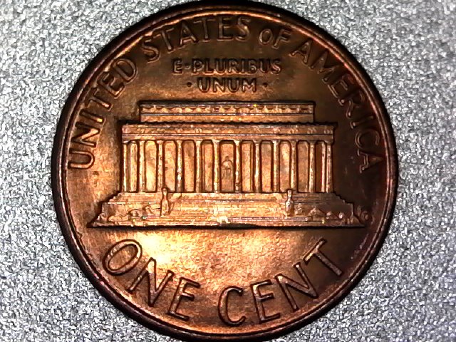 Penny-With-Raised-Half-Circle-Going-Thru-In-God-We-Trust