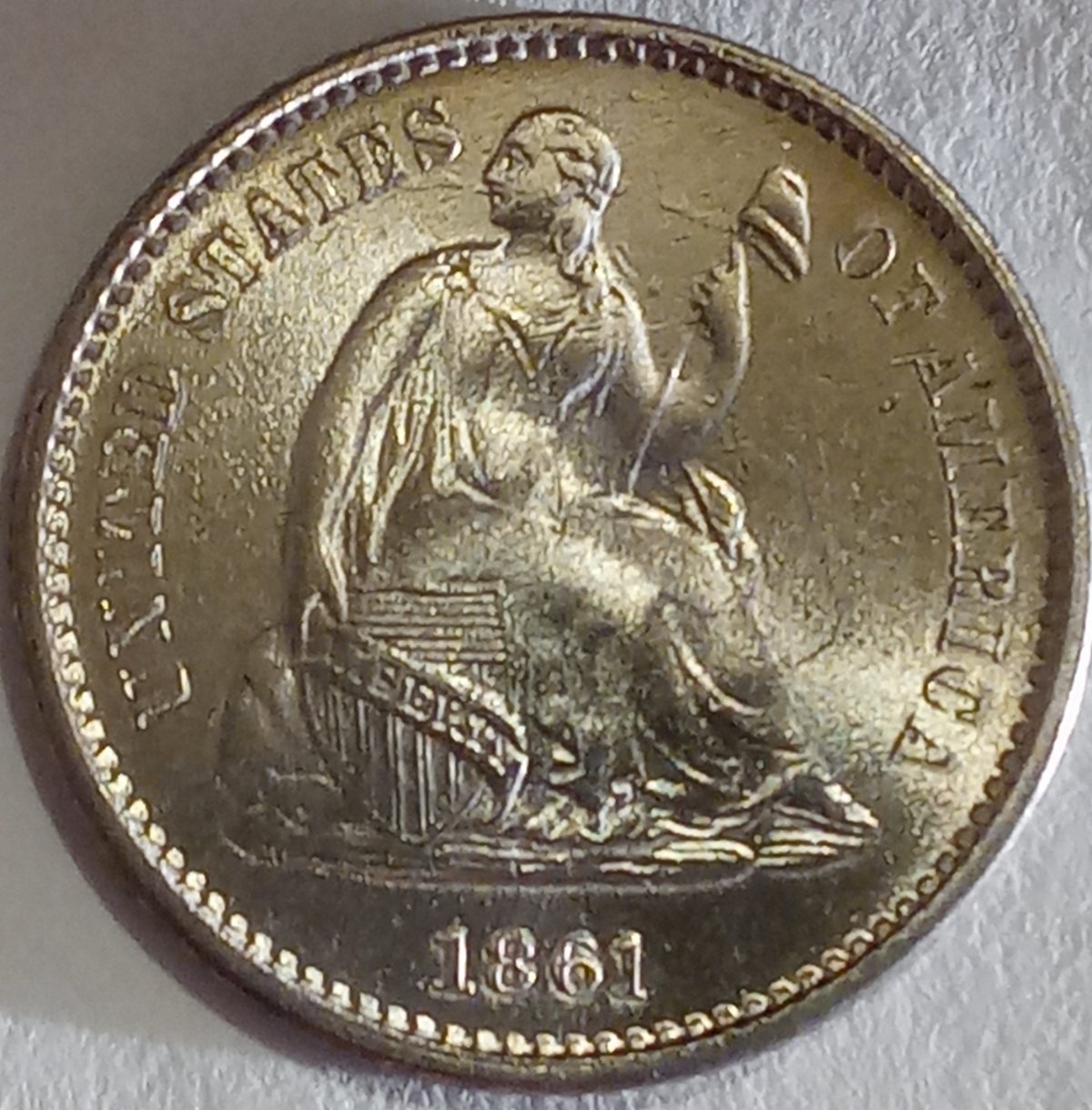 On-A-1861-Half-Dime,-Yikes-Grade!